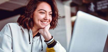 student at school on computer